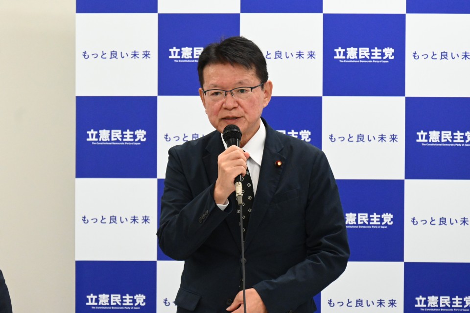 長妻昭