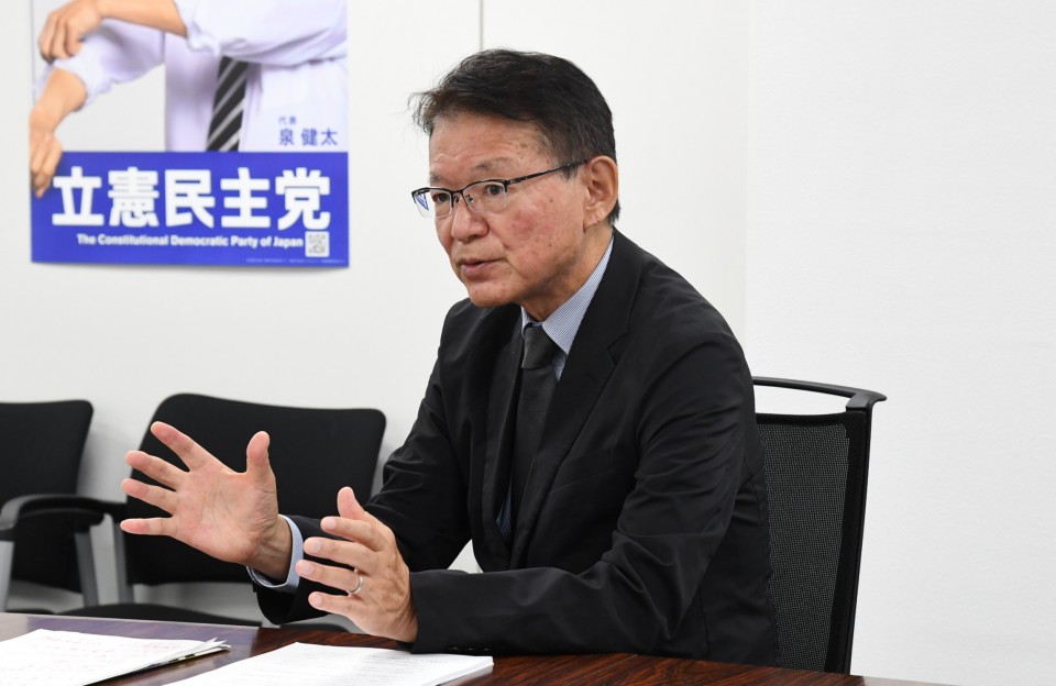 長妻昭