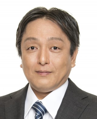 出原賢治